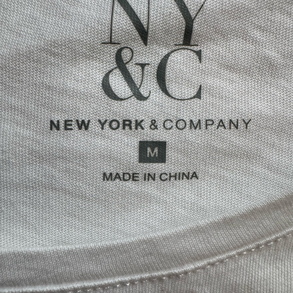 Clean and Unique New York & Company White Top with Pink Fashionista Graphic